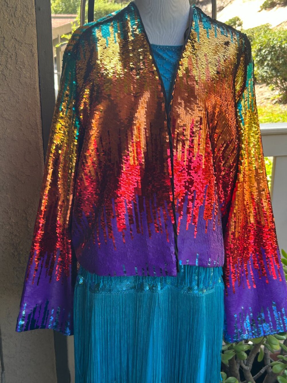 Multi colored sequined long sleeved jacket